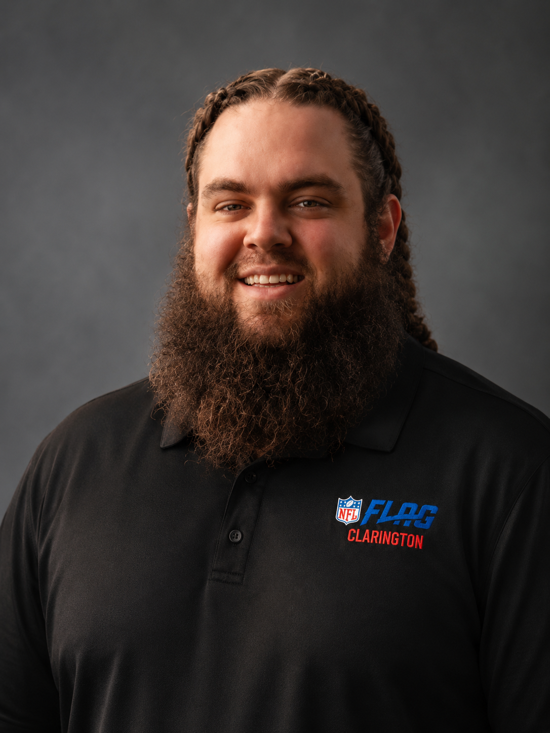 Cody, co-founder of Clarington NFL Flag Football, wearing the official league polo