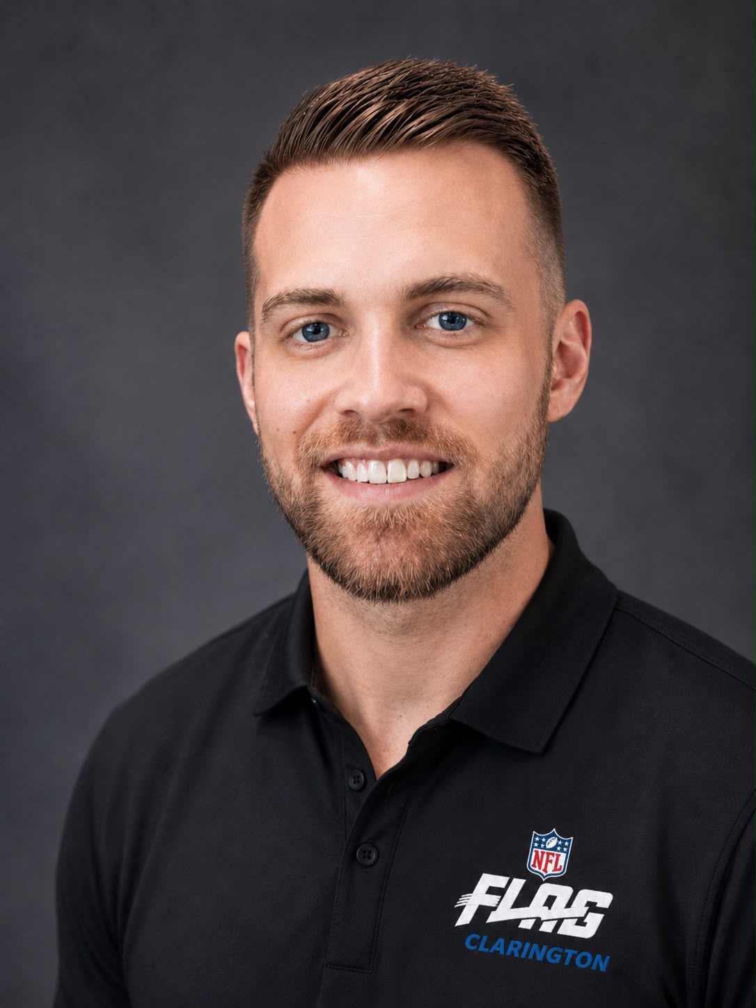 Kyle, co-founder of Clarington NFL Flag Football, wearing the official league polo